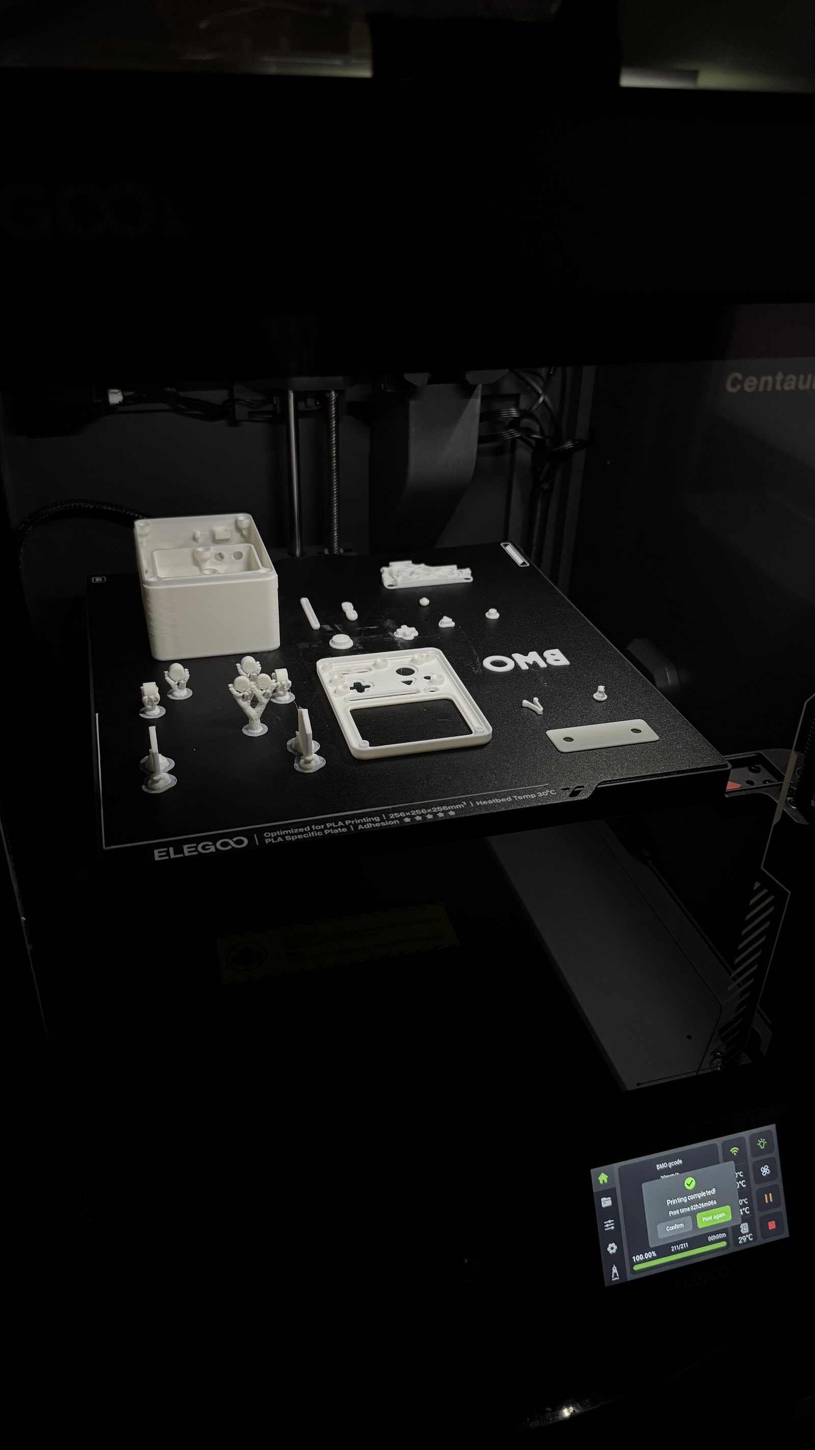 3D-printed robot companion parts fresh off the print bed